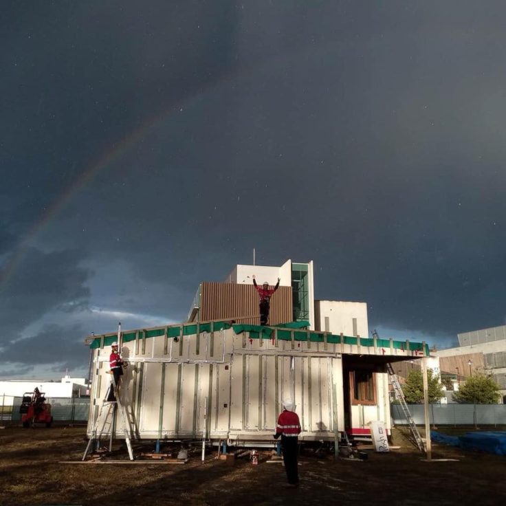 Dan Simpson atop Desert Rose House